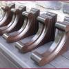 Custom carved mahogany brackets